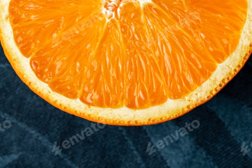 Preview: Sliced half of juicy orange close up