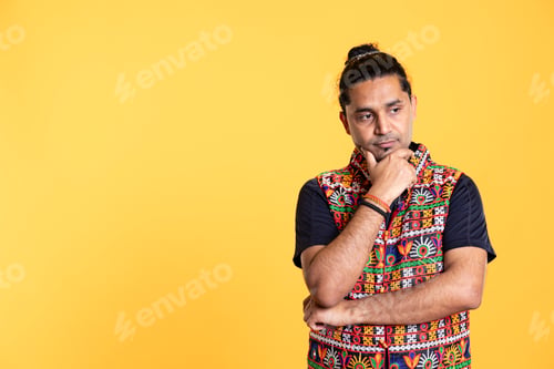 Preview: Pensive man deep in thoughts, doing ruminating hand gesturing,