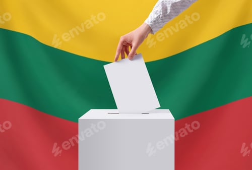 Preview: Elections, Lithuania. A hand throws a ballot into the ballot box. Voting concept.