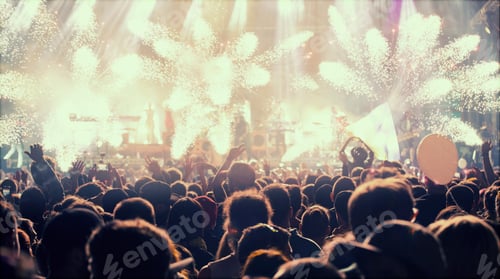 Preview: New Year concept - cheering crowd and fireworks