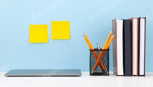 Preview: Studio workspace with laptop computer and office supplies