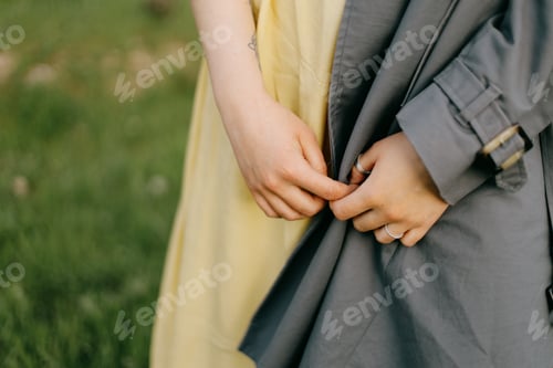 Preview: hand holds a hand, clothing colors of the flag ukraine