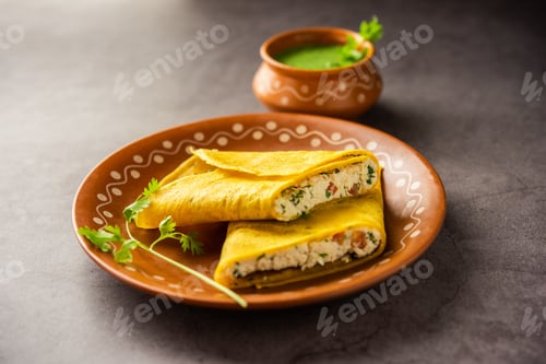 Preview: Paneer stuffed Besan chilla or Cheela made using chickpea flour with cottage cheese stuffing