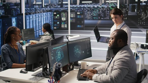 Preview: Happy data center manager providing positive feedback to engineer