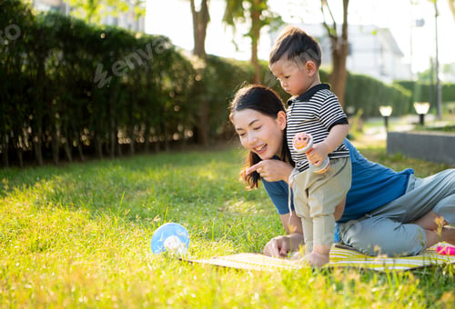 Preview: While in vacation at home, a mother engages in activities with little kid in the park