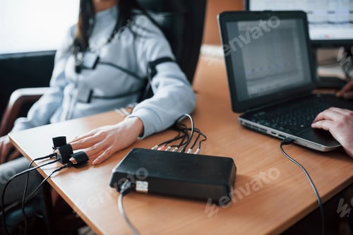 Preview: Fidelity verification. Girl passes lie detector in the office. Asking questions. Polygraph test