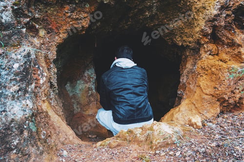 Preview: Young man get in into a dark cave