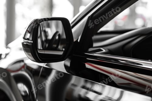Preview: rear view mirror. Focus to mirror view. side rear-view mirror on a car.