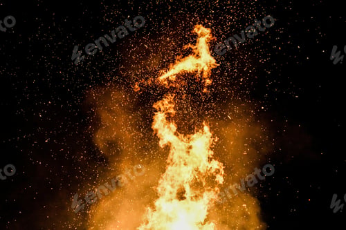 Preview: Shot of burning wood in the night