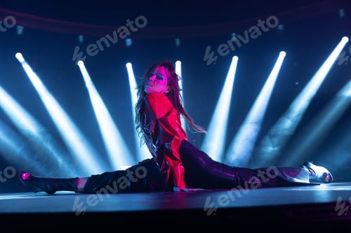 Preview: Attractive Caucasian woman in a twine pose in a club with neon lights in the background