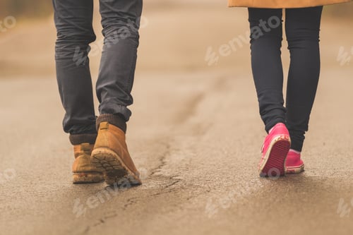 Preview: Young Couple / Pair Walking Down The Street.