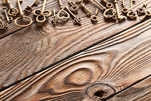 Preview: Various metal keys on wooden background