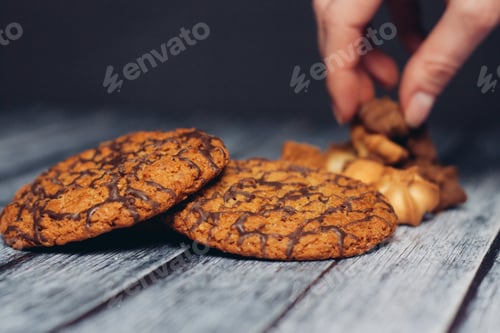 Preview: Chocolate Drizzled Cookies on a Grey Wooden Surface