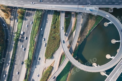 Preview: Road junction and bridge in city top view, aerial view.