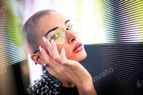 Preview: Beautiful woman illuminated by led lights