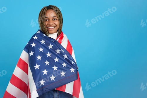 Preview: African woman wrapped in an US flag