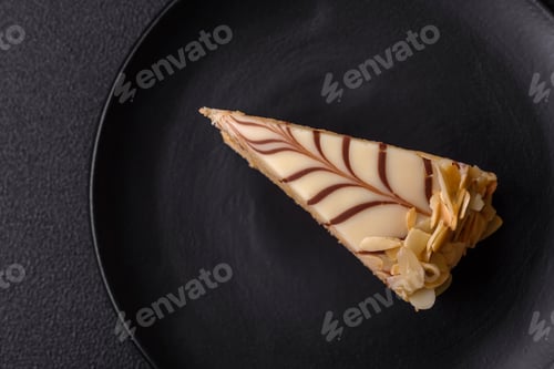 Preview: Piece of delicious sweet esterhazy cake with nuts and cream
