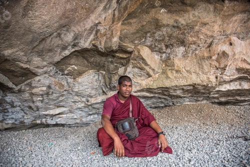 Preview: Buddhist monk visit to the Aurangabad Caves, India.