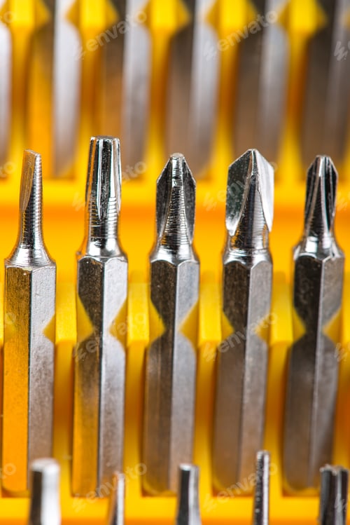 Preview: Set Of Screw Tips And Extensions With The Screwdriver In The Yellow Toolbox