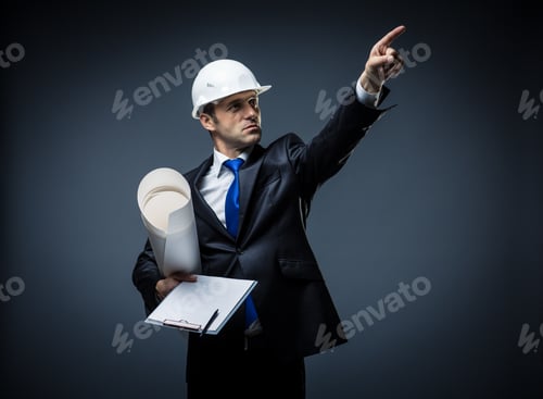 Confident Architect in Suit Holding Blueprints and Pointing