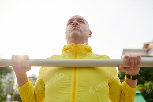 Preview: Man Doing Chin-ups Exercise