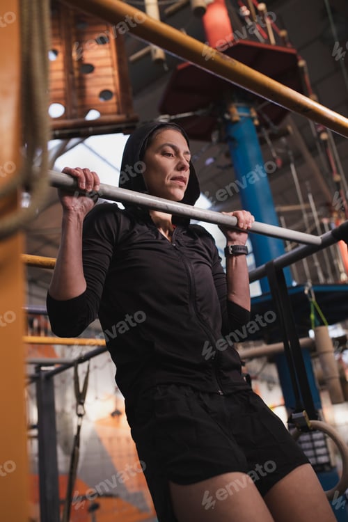 Preview: Athletic woman training in gym