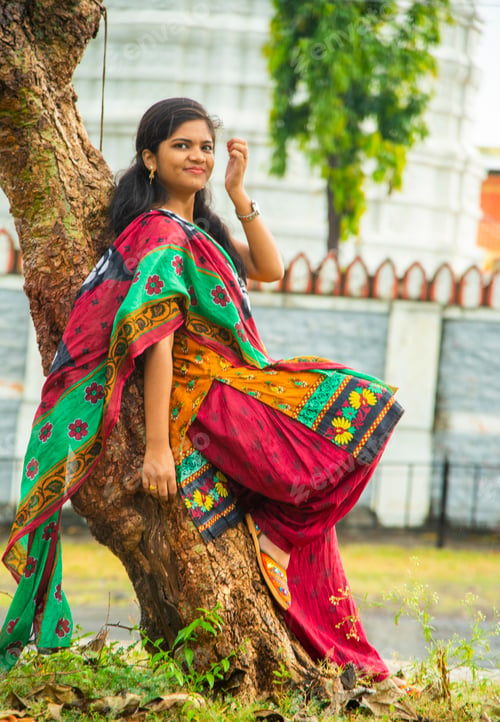 Preview: Happy young beautiful Indian woman at the park outdoor