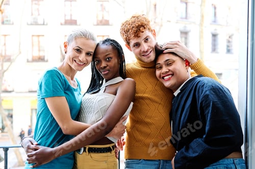Preview: Portrait of a multiethnic gay and lesbian couple embracing together on a balcony