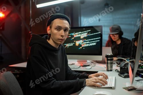 Preview: Male programmer applying anti-terror software