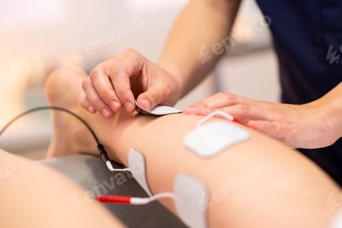 Preview: Electro stimulation in physical therapy to a young woman