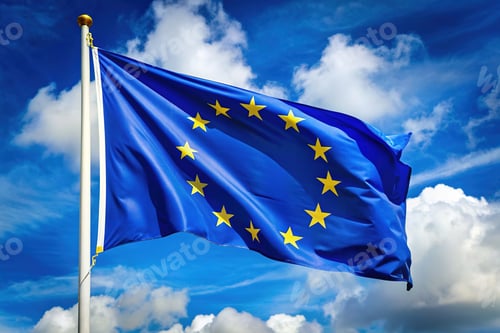 Preview: Union flag waving in the wind against a blue sky with clouds