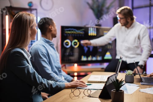 Preview: Man showing financial statistic of company for partners