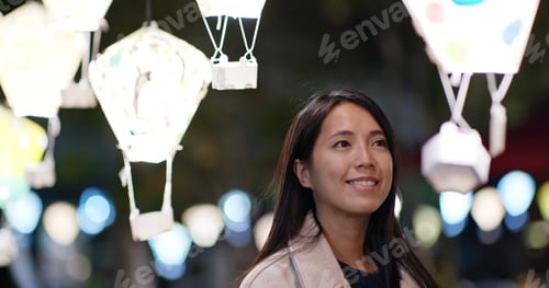Preview: Chinese Woman look at the lantern at night