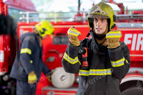Preview: Fireman or firefighter stand and show some action look like he report the event