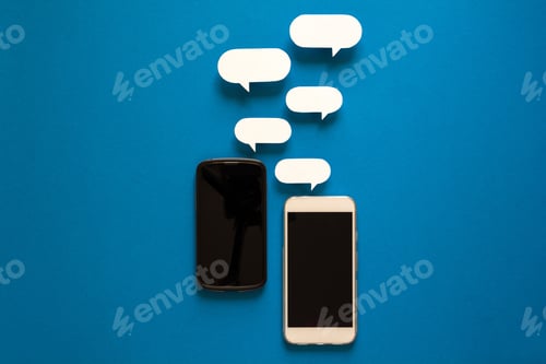 Preview: Smartphones with paper speech bubbles on blue background
