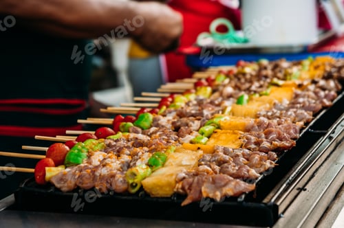 Preview: A popular barbecue with pork fillet, tomato, to taste and grill , bar-b-q on hot grill