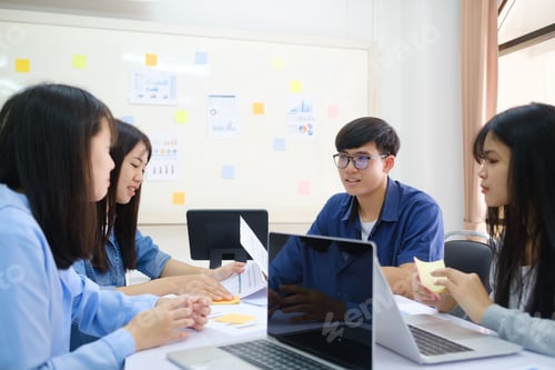 Preview: Young startup business people teamwork.