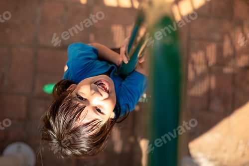Preview: Active little girl on playground