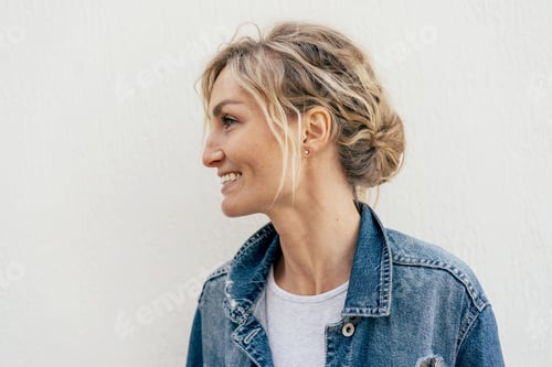 Preview: Smiling Woman with Blonde Hair and Denim Jacket