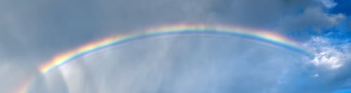 Preview: Blue sky and white cloud with sun light and rainbow