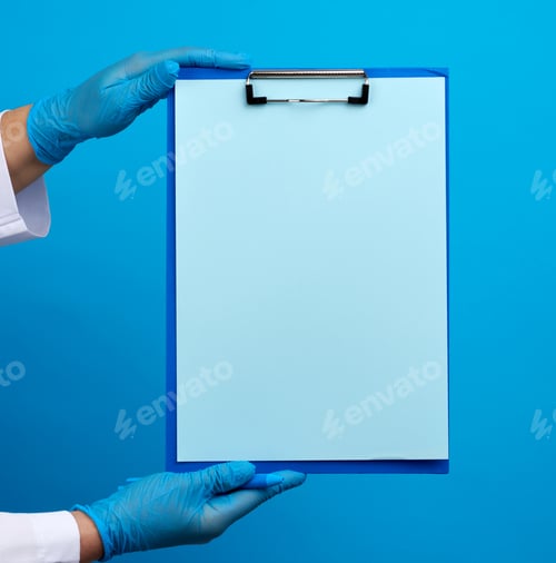 Preview: Female doctor's hands in blue medical latex gloves holds a folder with a paper clip