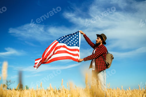 Preview: 4th of July. American Flag. Traveler with the flag of America.