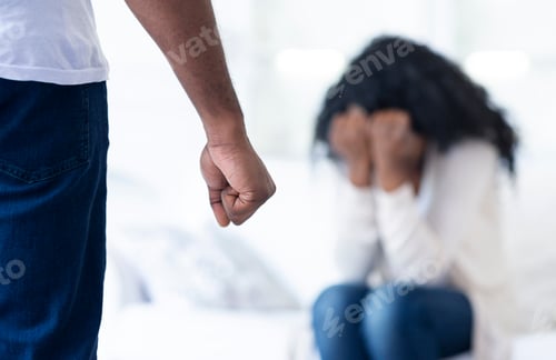Preview: African-american man threatening his scared girlfriend with fist
