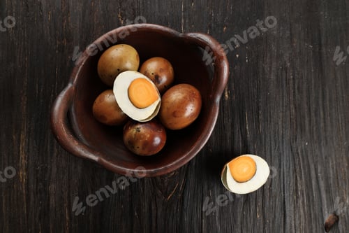 Preview: Top View Telur Asin Bakar or Black Smoked Salted Egg