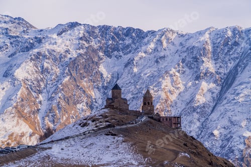 Preview: Gergeti Trinity Church in the Caucasus Mountains near Stepantsminda, Georgia.