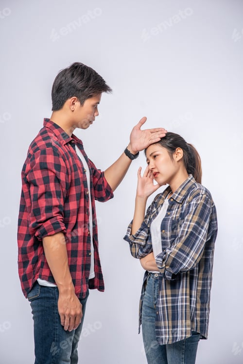 Preview: A sick woman had a man look and touch his forehead.