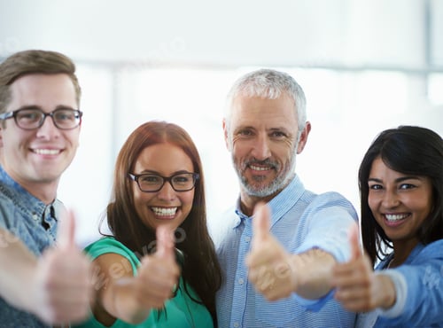 Preview: Well get the job done. Cropped portrait of a group of businesspeople giving the thumbs up.