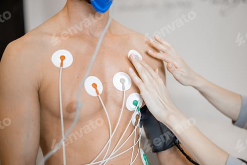 Preview: Torso of man athlete with electrodes