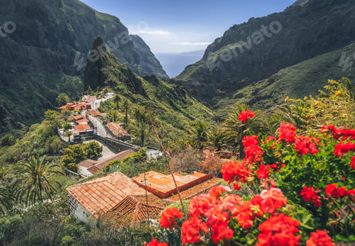 Preview: Mountain village in Masca valley in Tenerife, Canary Islands, Spain. Green steep gorge with hiking