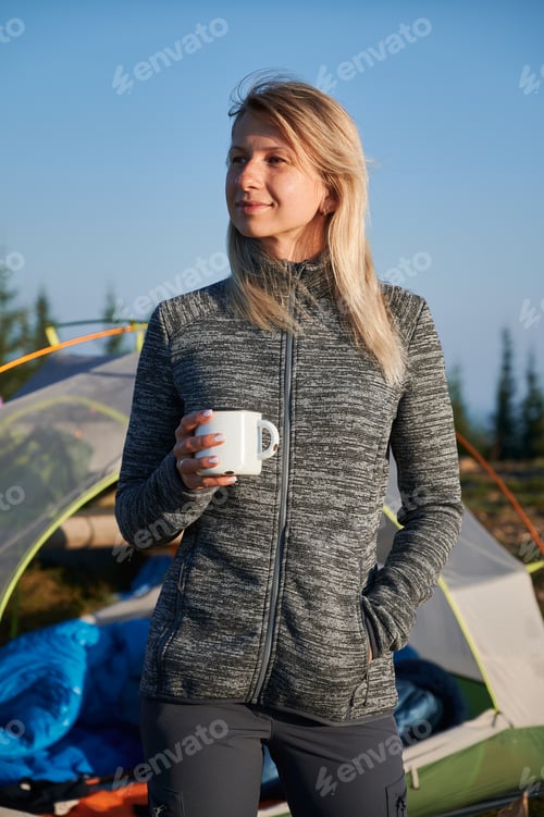 Preview: Recreation of female hiker in the nature with touristic tent.